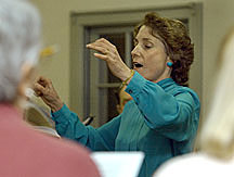 Tina Johns Heidrich, founder and director of the Connecticut Master Chorale, leads a rehearsal.